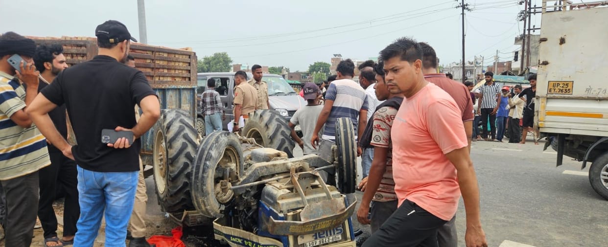 Truck collides with tractor-trolley on highway; two critically injured.