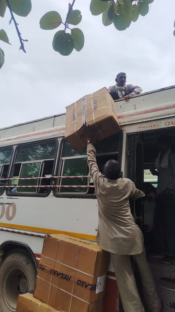 RTA inspection at the bus stand; warning issued to driver of overloaded bus.