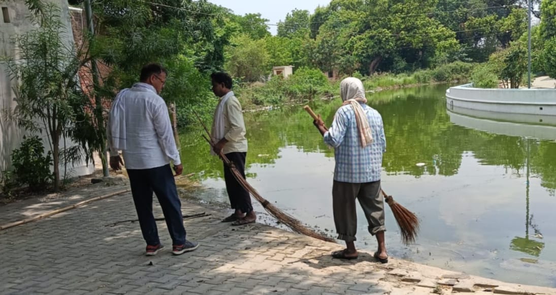 Shiva temple's pond cleaned; dead fish removed.