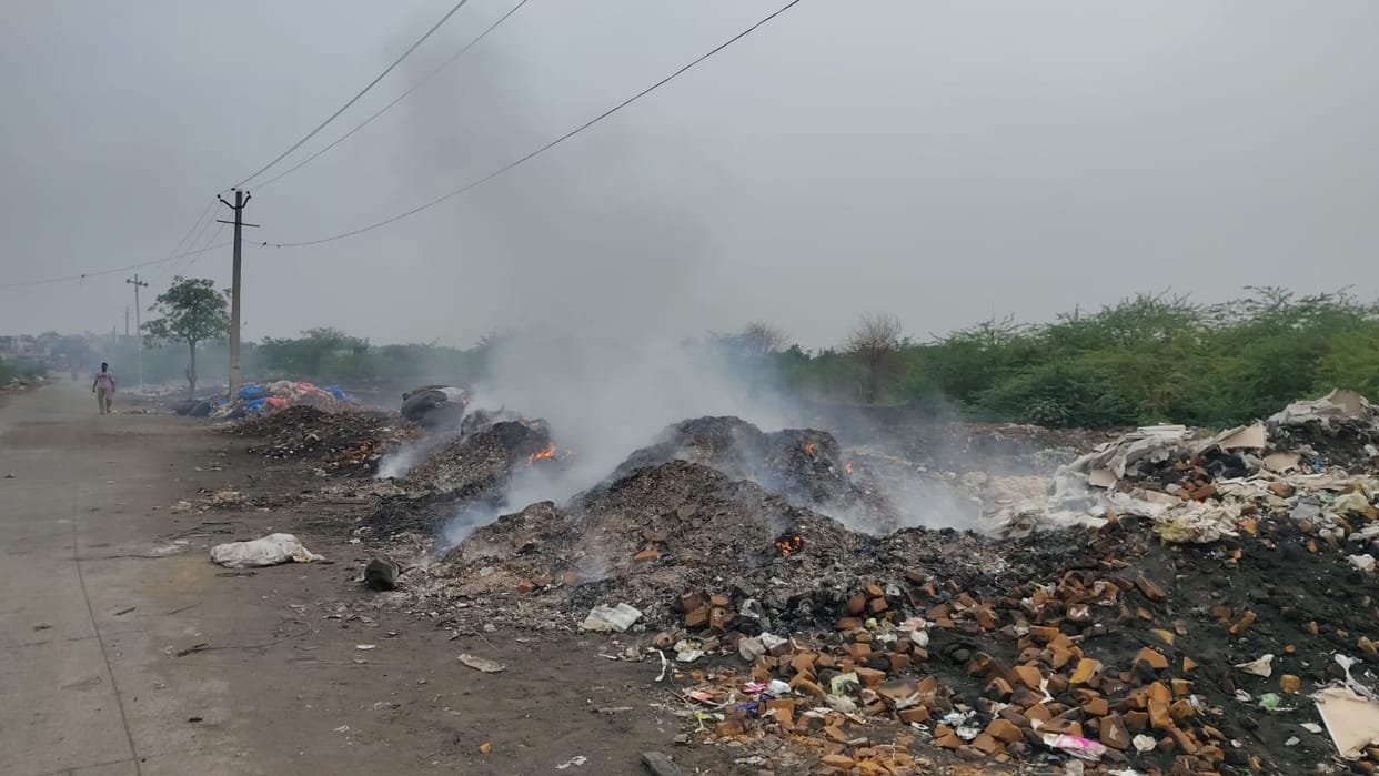 Garbage pile set on fire in the open in Sector-20.