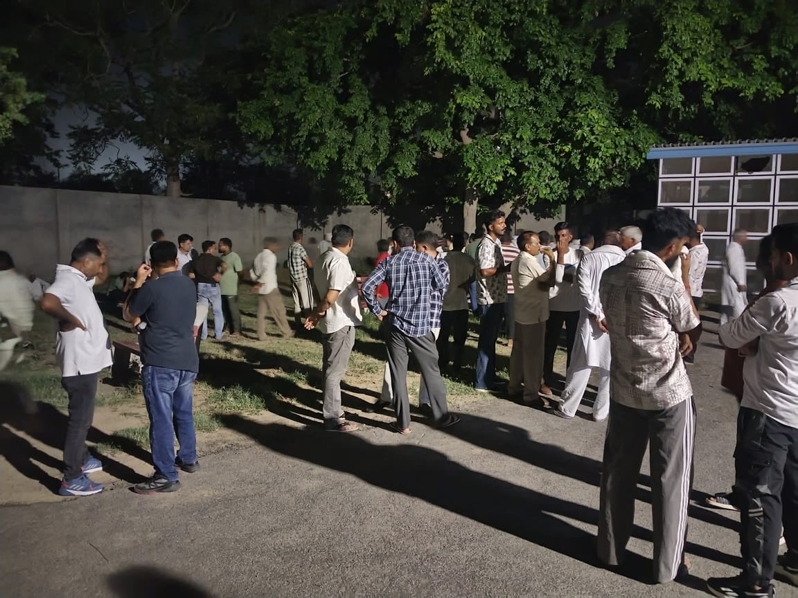 The attackers shot the victims in the chest and head, then fled, leaving behind a motorcycle and two pistols