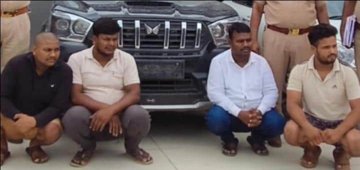 Crackdown on gang facilitating illegal crushed stone transport by tipping off drivers about officials' locations; four lookouts arrested, three vehicles seized.