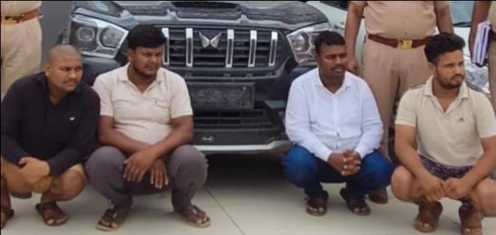 Crackdown on gang facilitating illegal crushed stone transport by tipping off drivers about officials' locations; four lookouts arrested, three vehicles seized.