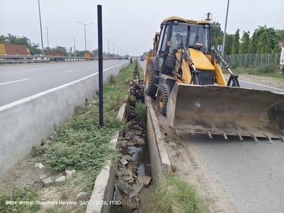 Cleaning of drains on both sides of NH-48 started to prevent waterlogging.