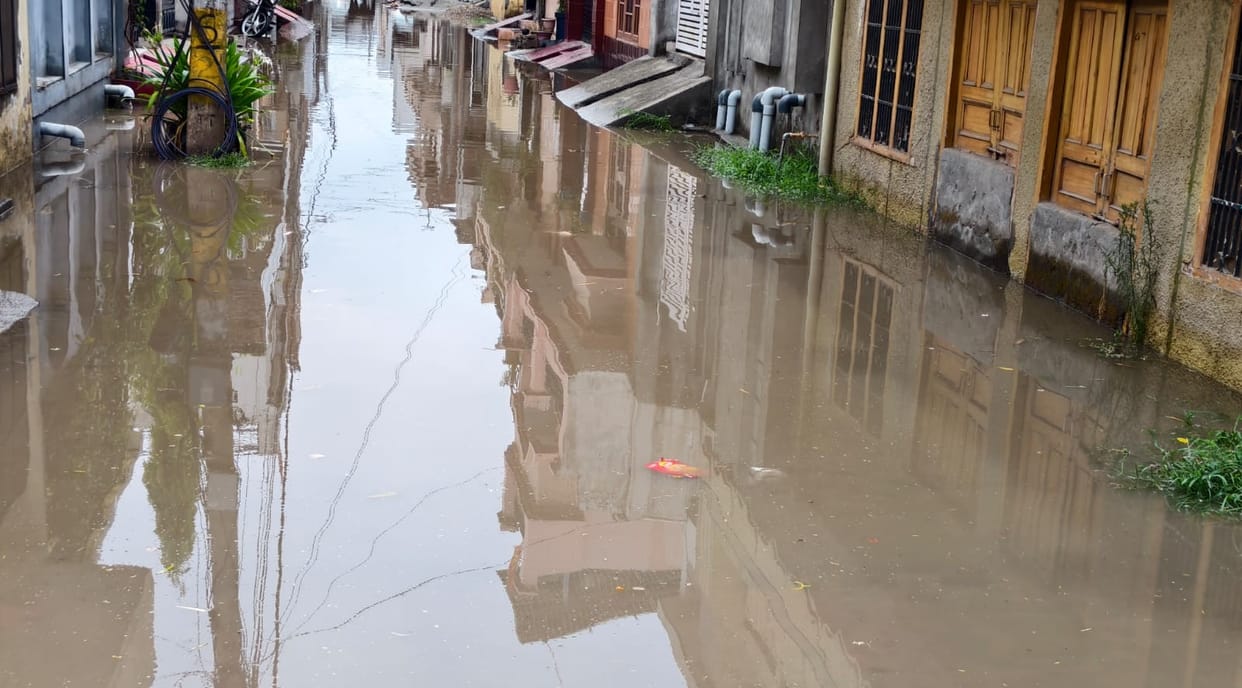Waterlogged streets following the first monsoon rain.