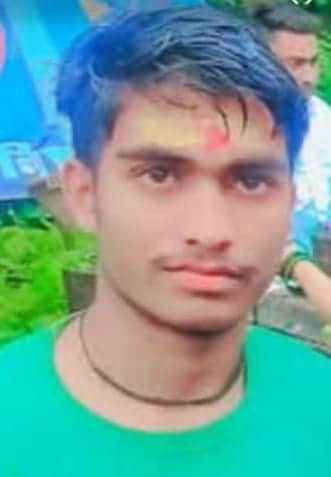 Missing grocer murdered; angry crowd blocks road.