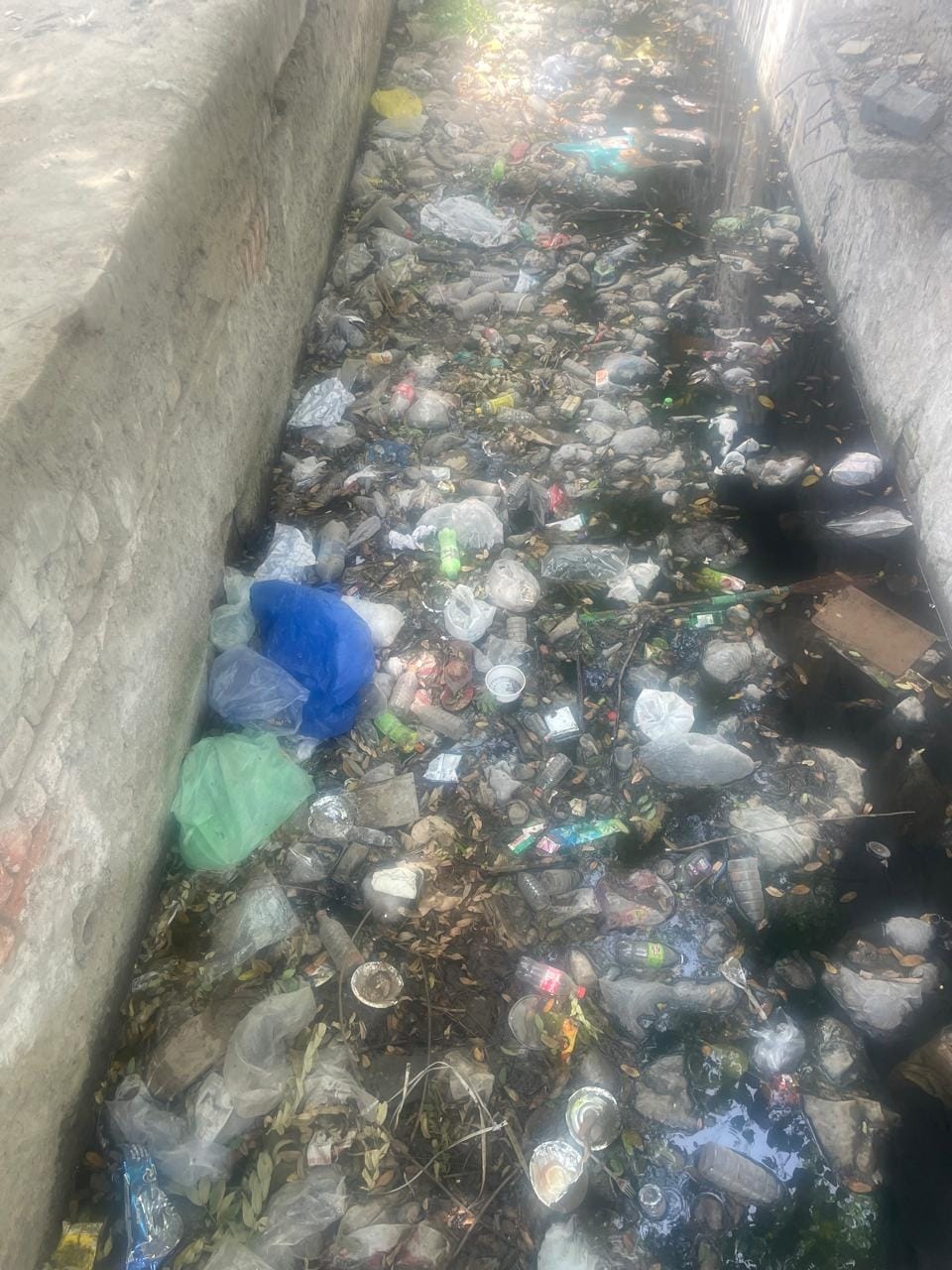Municipal Council's claims exposed by the first rain; waterlogging poses risk of accidents.