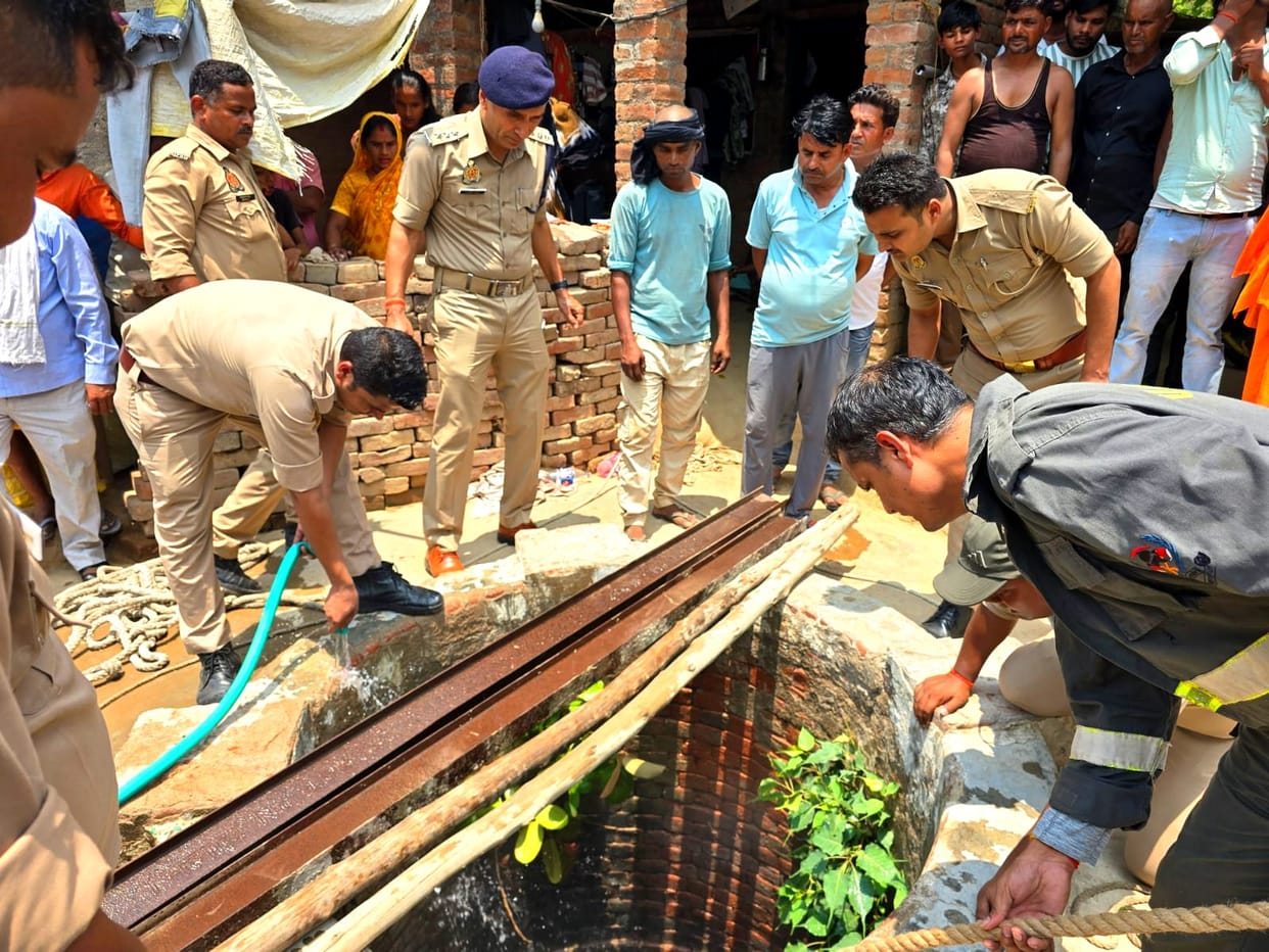 Firefighters descended into a 60-foot-deep well and rescued a young man.