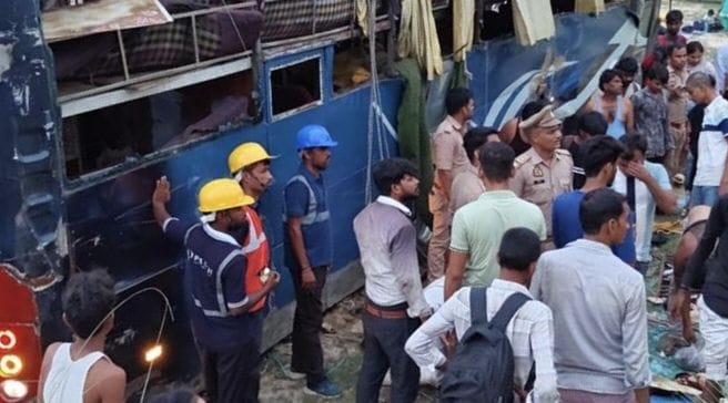 Out-of-control sleeper bus plunges 15 feet into a field off Ganga Expressway; 35 passengers injured.