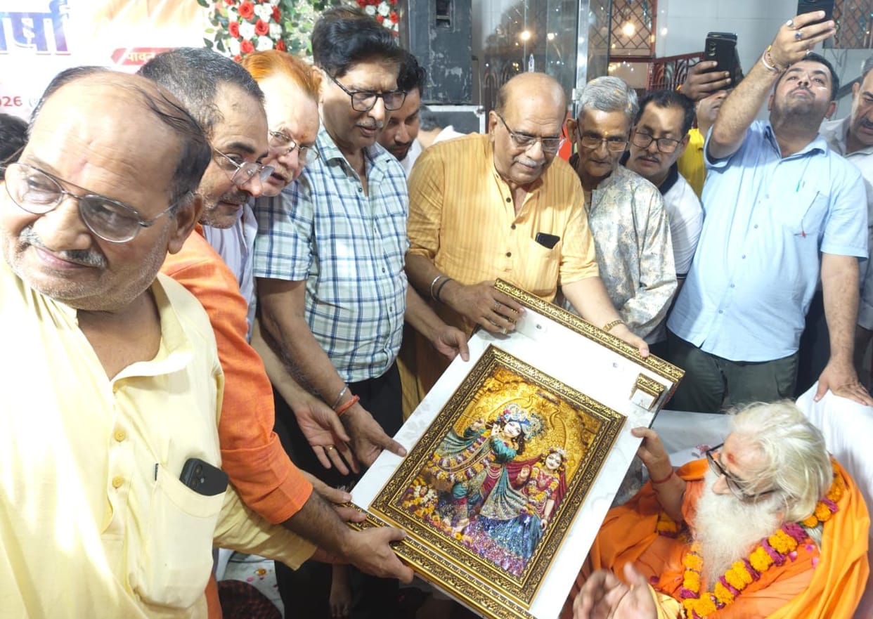 Honoured by presenting a picture of Radha-Shyam.