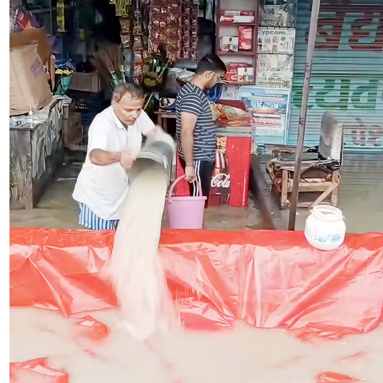 Rain exposes the truth... flaws in sanitation; water floods everything from shops to homes.