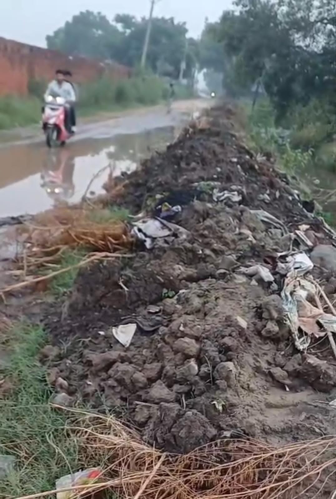 Two-wheeler riders are getting injured after slipping on silt spread across the road.