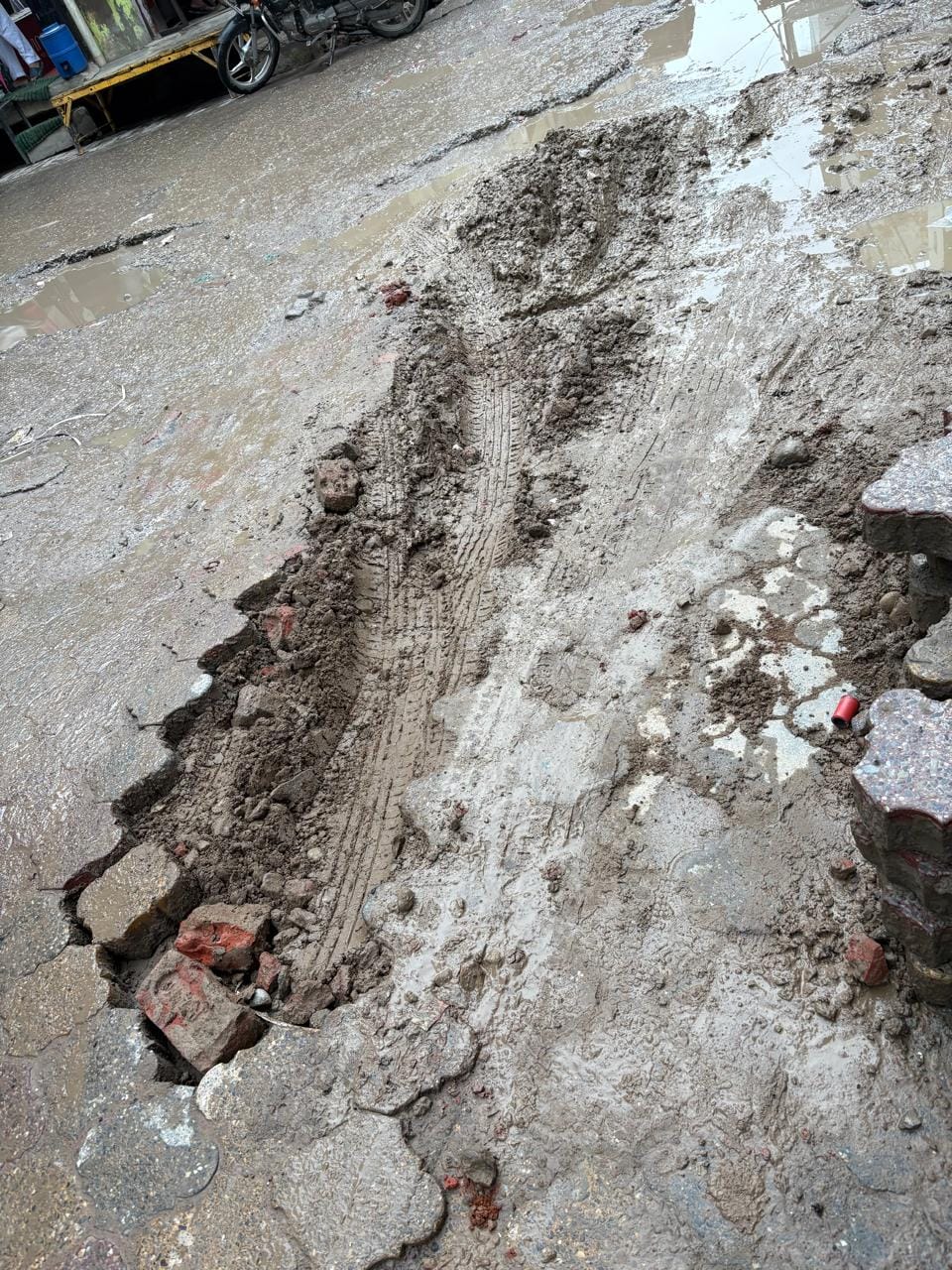 Ganj Bazaar road caves in after the very first rain; traders express outrage.