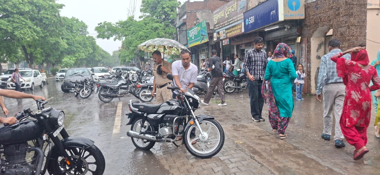 Candidates reached the exam center drenched in the rain