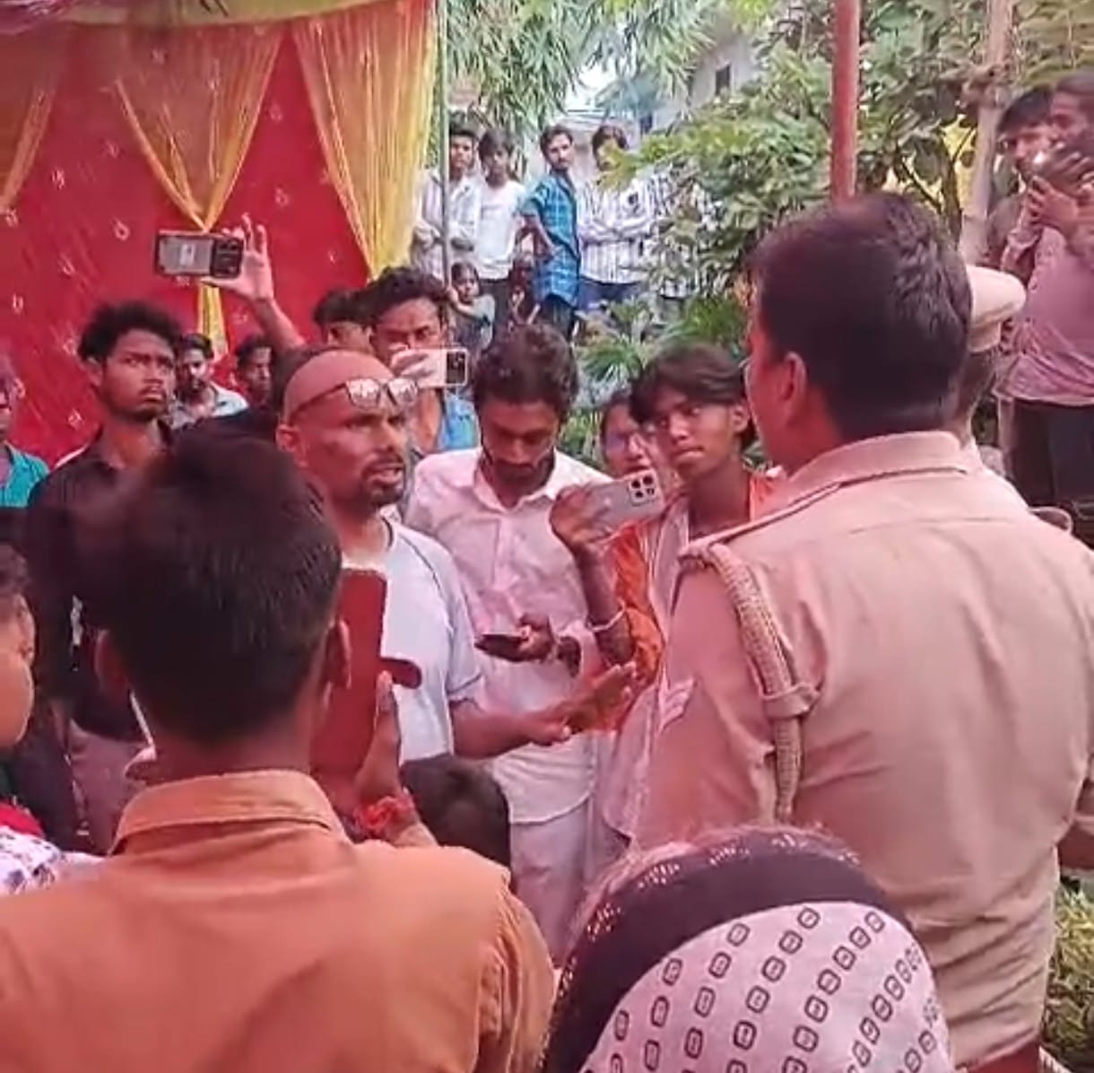 Uproar over reports of religious conversion; police detain six people for questioning.