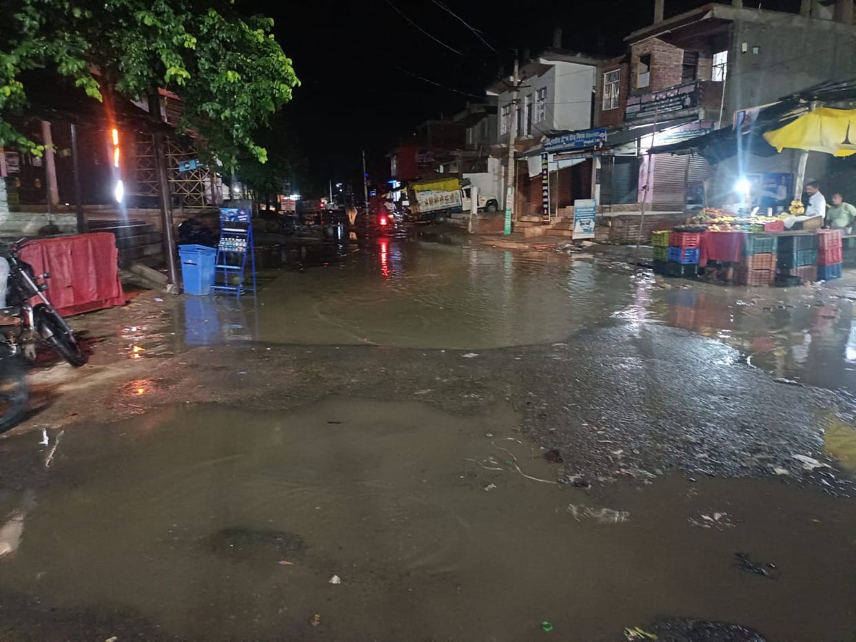 Road in Utmapur village crumbling due to waterlogging.