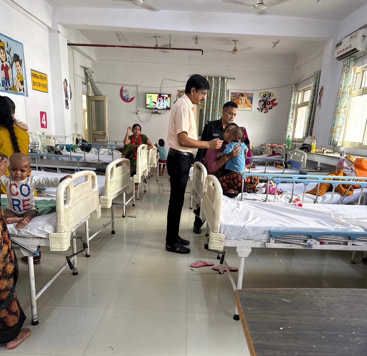 Havoc caused by heat and humidity; crowds of patients throng the district hospital.