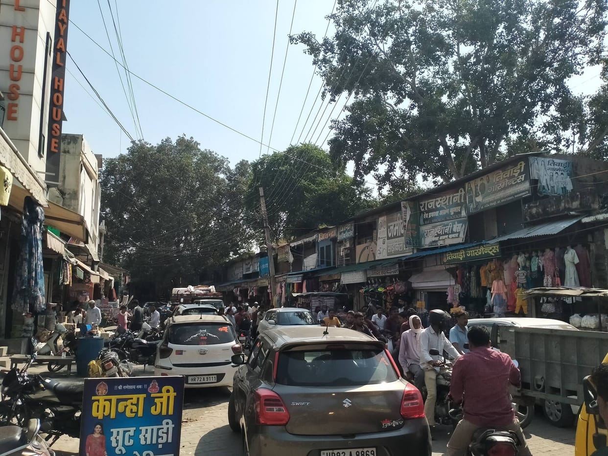 Goods from shops on the road and chaotic vehicle parking are causing increasing daily inconvenience.