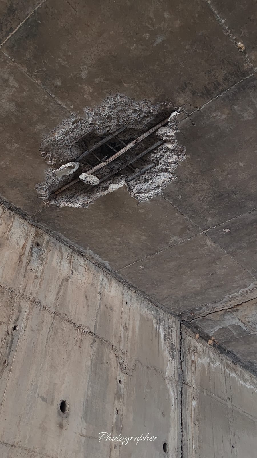 Plaster is peeling off the roof of the minor canal bridge near Kharkhada.
