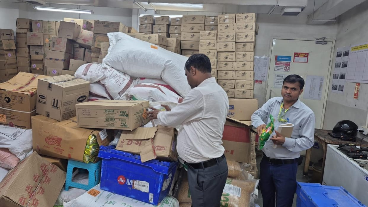 Raids conducted at two shopping centers; expired food items found at one.