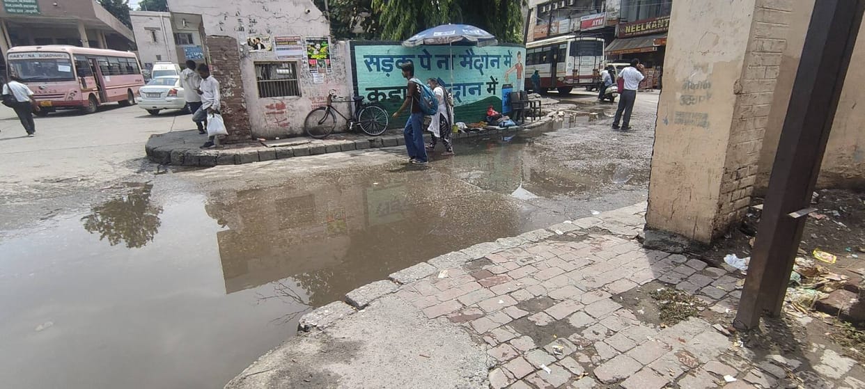 Accumulated toilet water at the main gate of the roadways complex