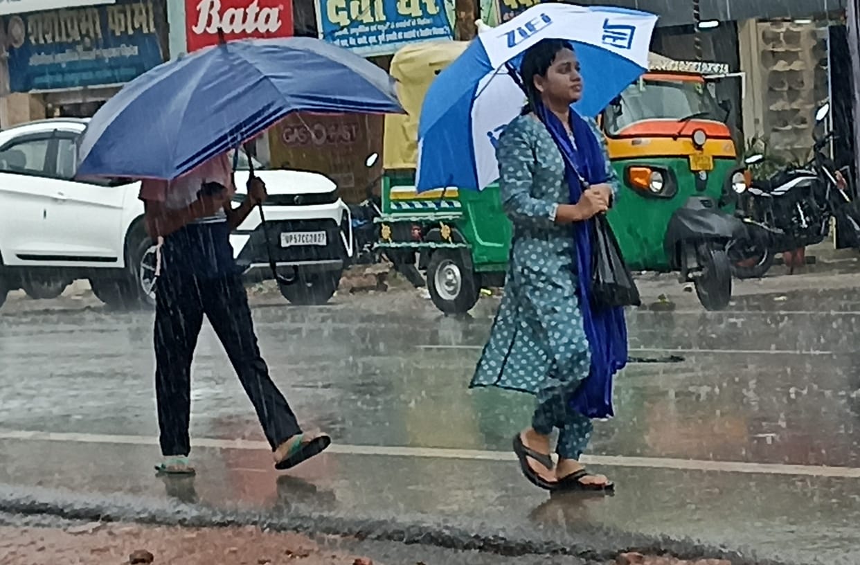 Even the rain could not bring relief from the sultry heat.