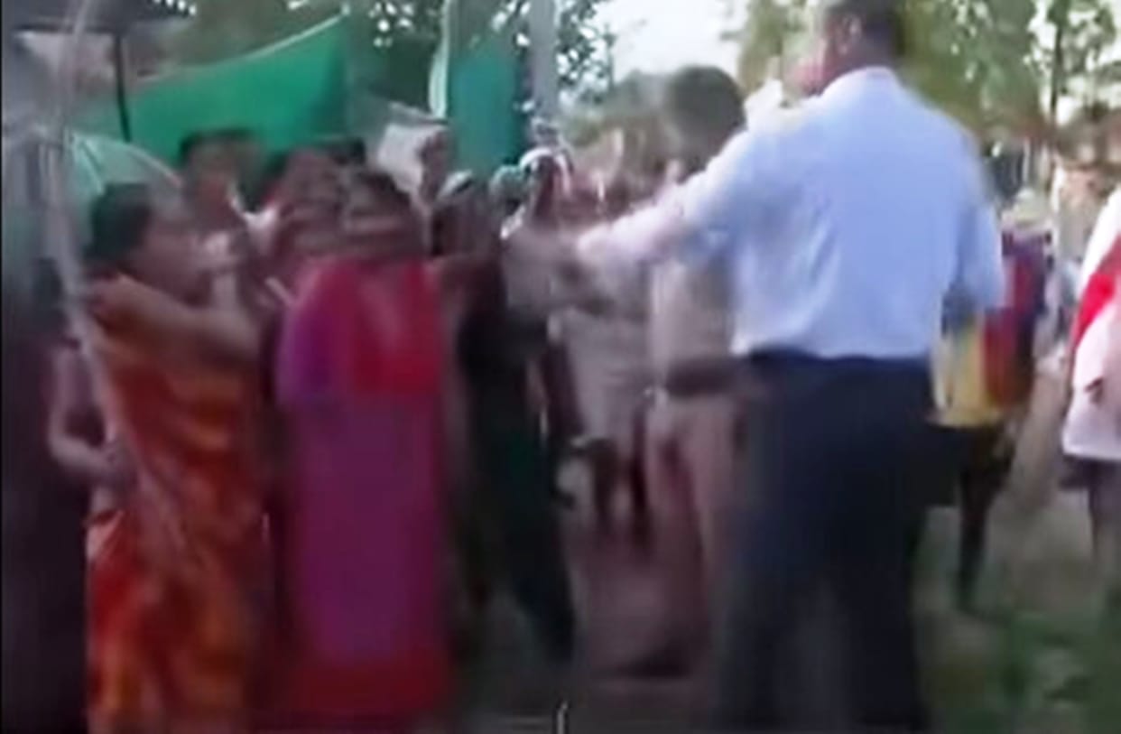 Team sent to remove encroachment faces opposition; video of women striking with sticks shared.