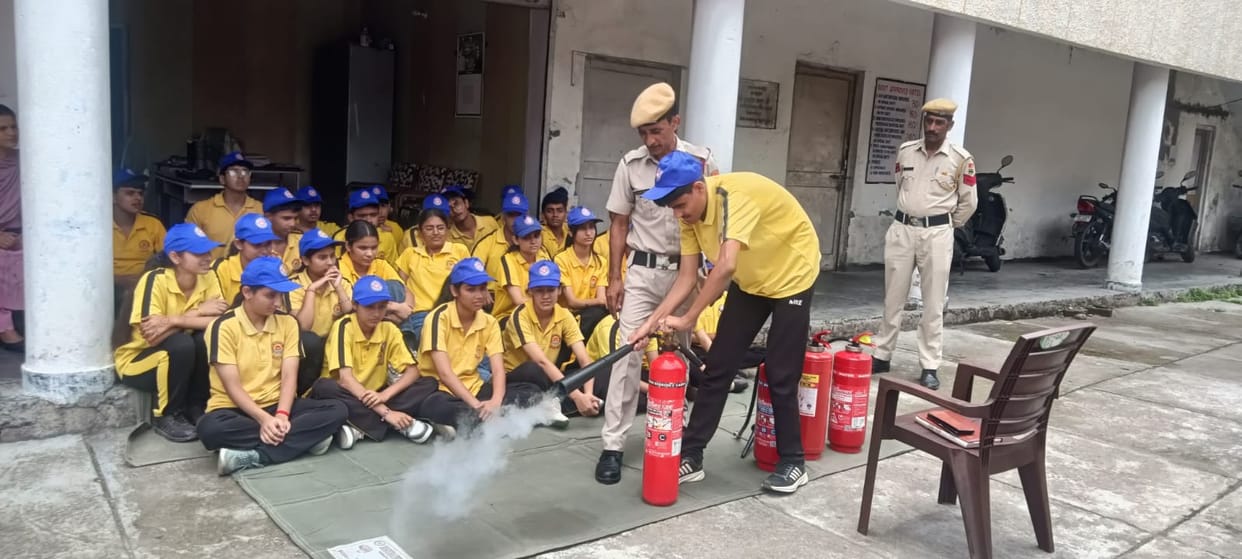 Volunteers learn fire safety and disaster management techniques
