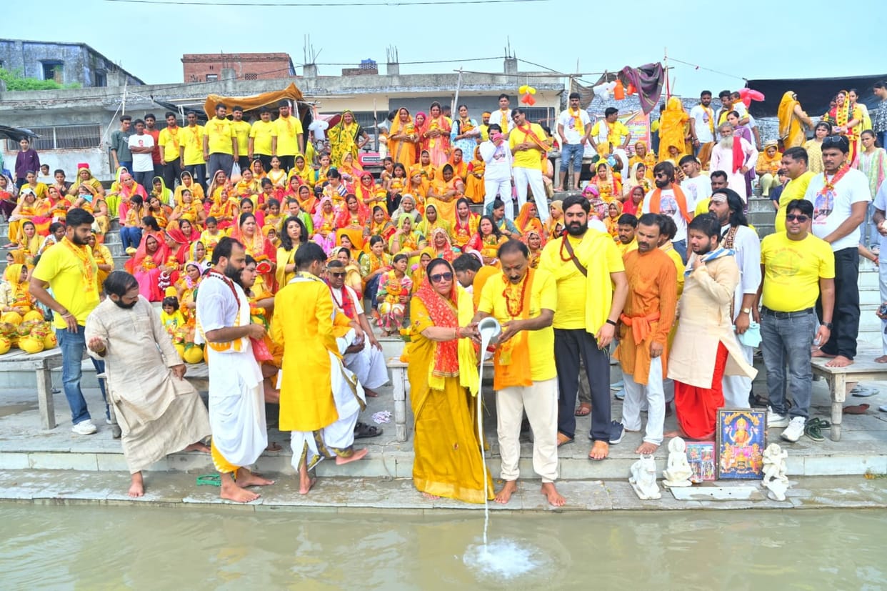 Bhagwat Katha begins with a Kalash Yatra; flowers showered as well.