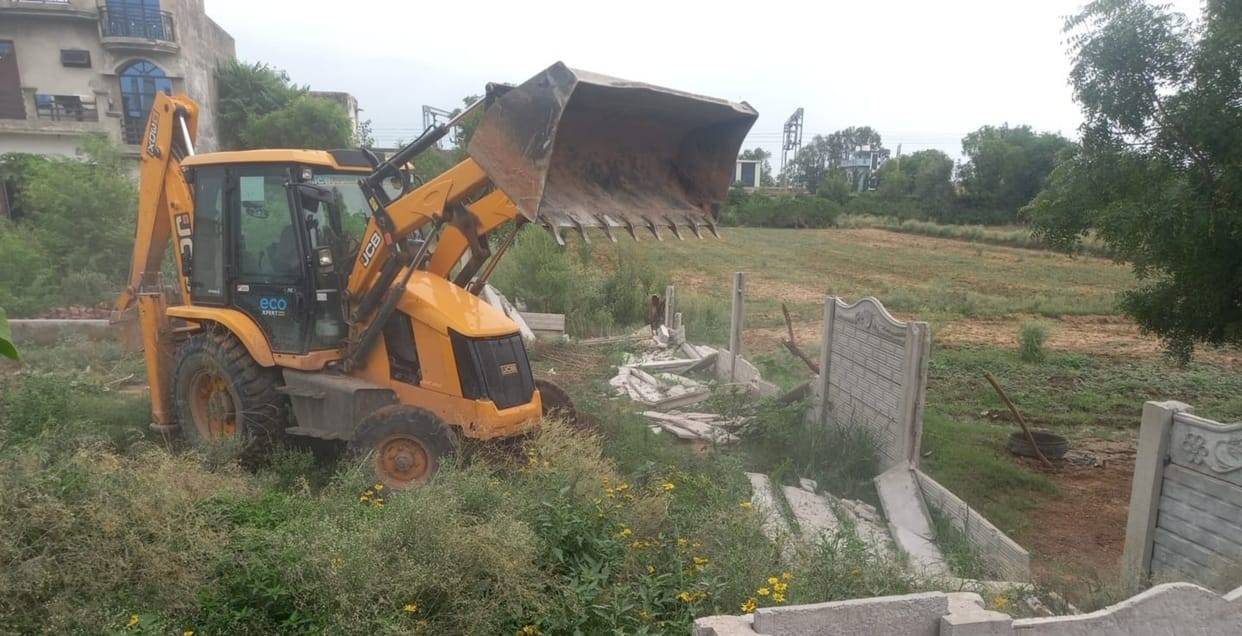 DTP's bulldozer razed the illegal colony.