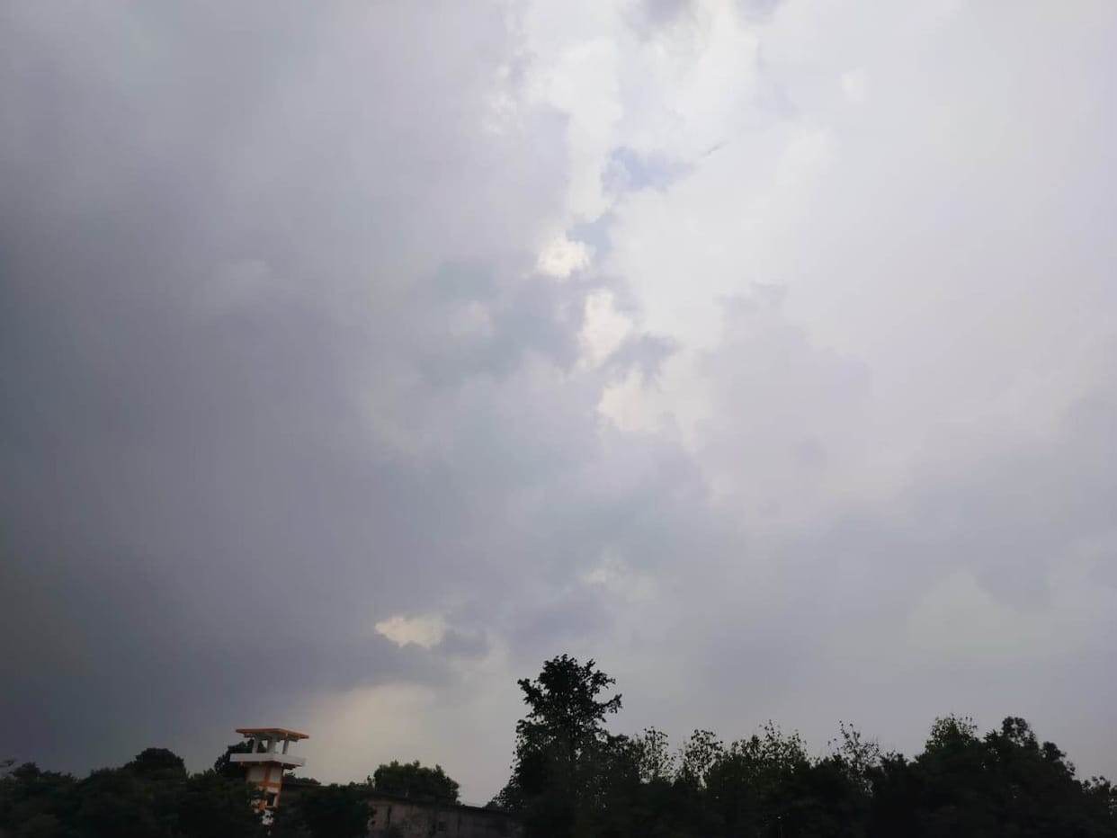 The clouds toyed with expectations and drifted away.