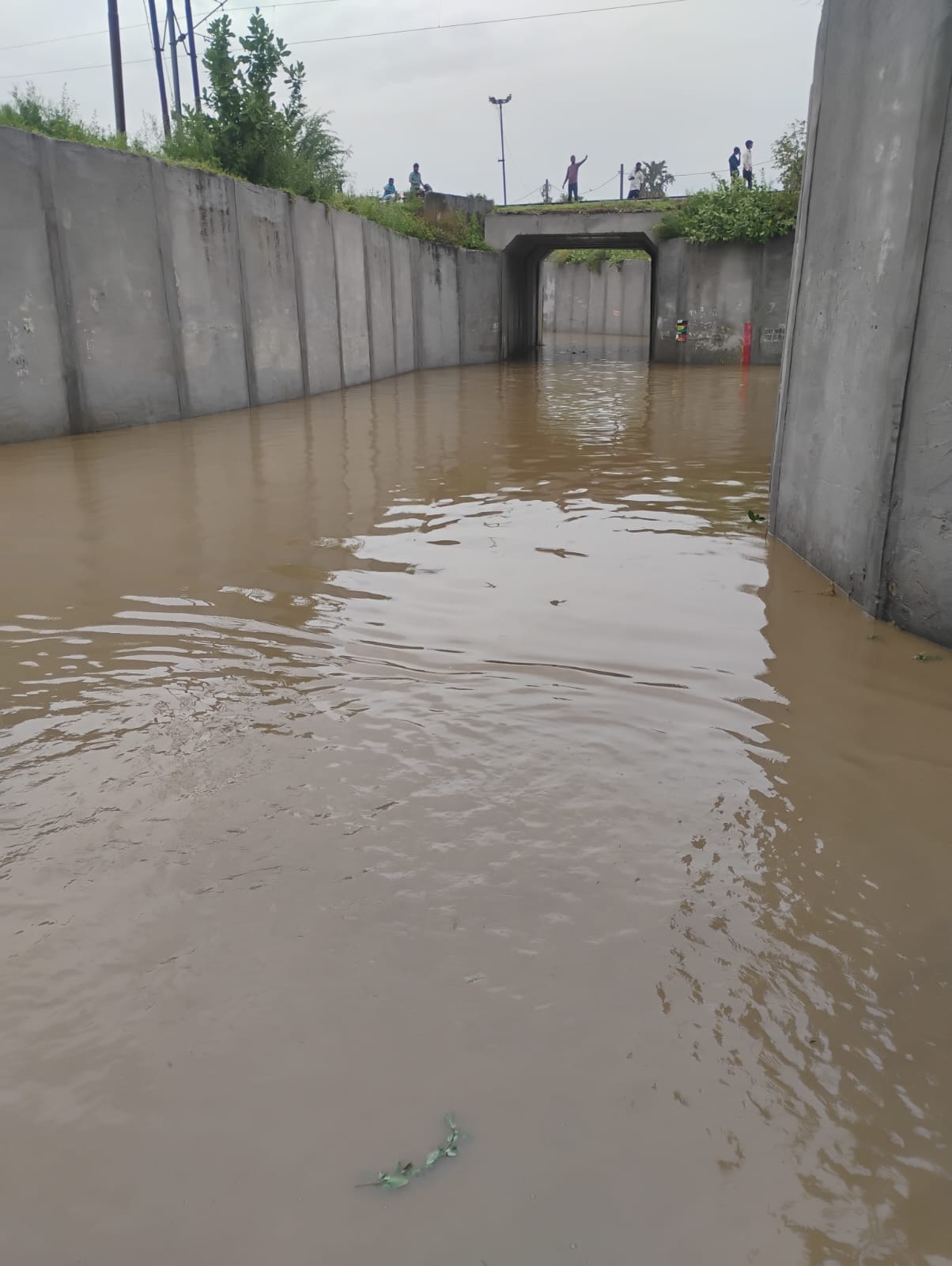 Railway underpasses submerged again in the rain.