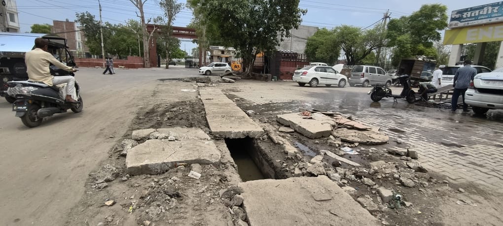 What kind of planning is this... the monsoon came, and the officials dug up the drains and left them