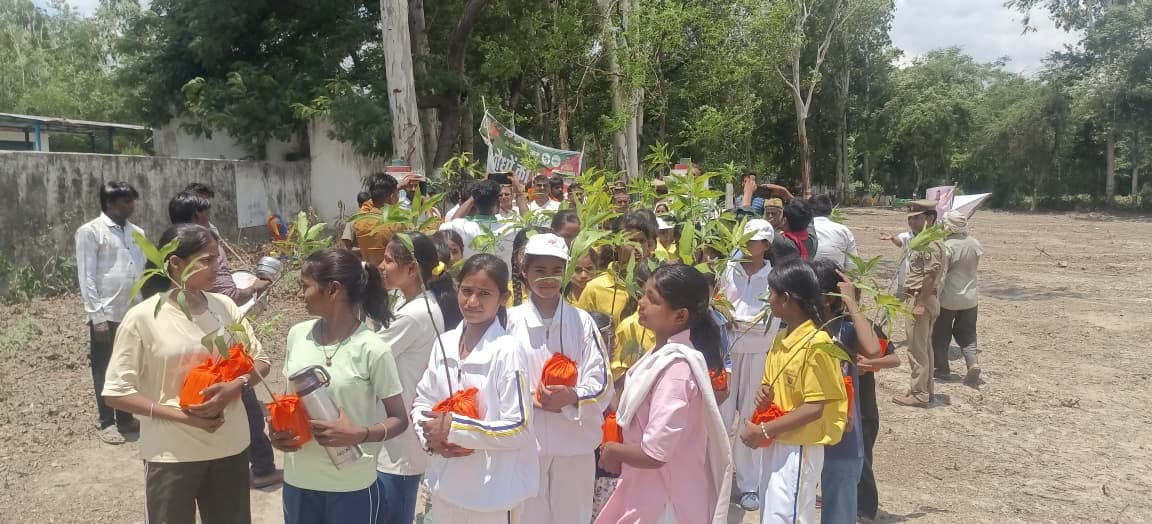 Female students took out a ceremonial procession for saplings.