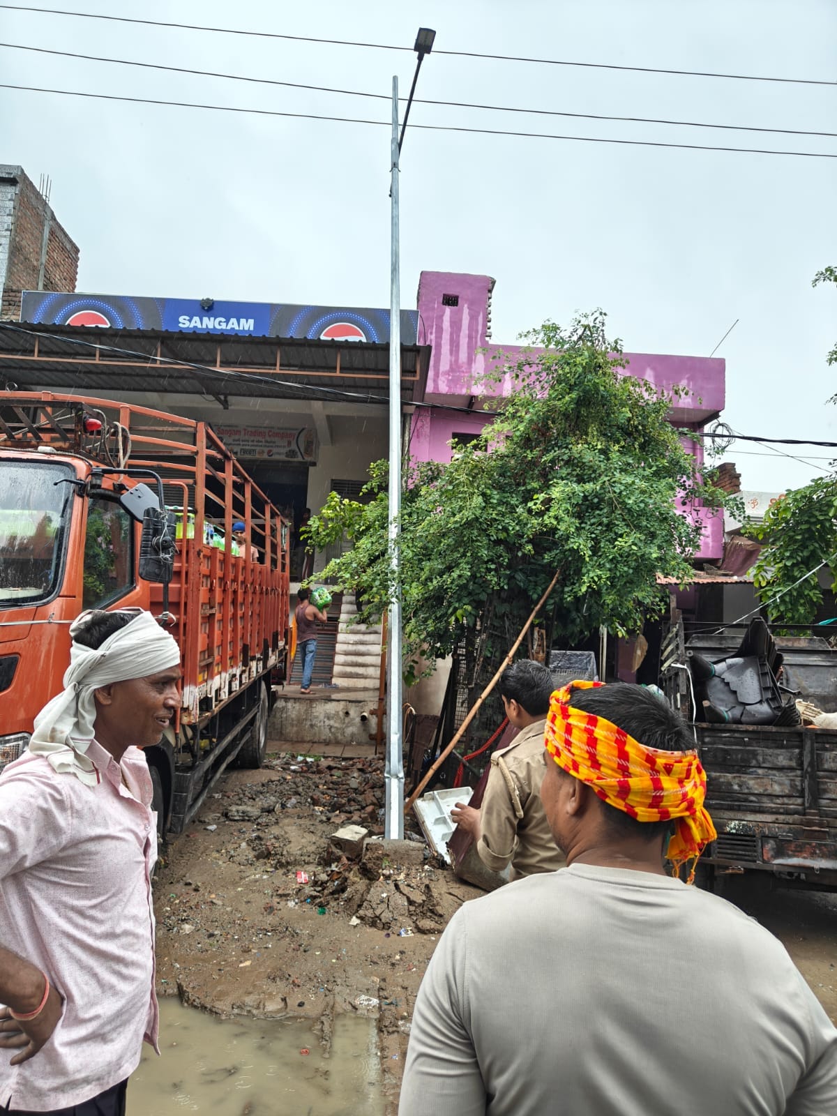 Street light pole falls on high tension line due to collision with canter