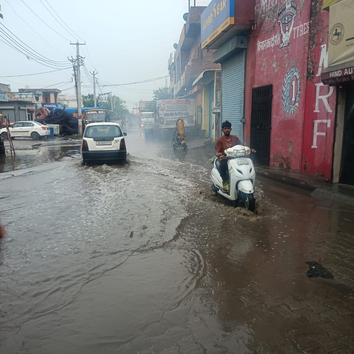 Heavy rain brought relief from the heat; waterlogging on roads caused inconvenience to motorists.