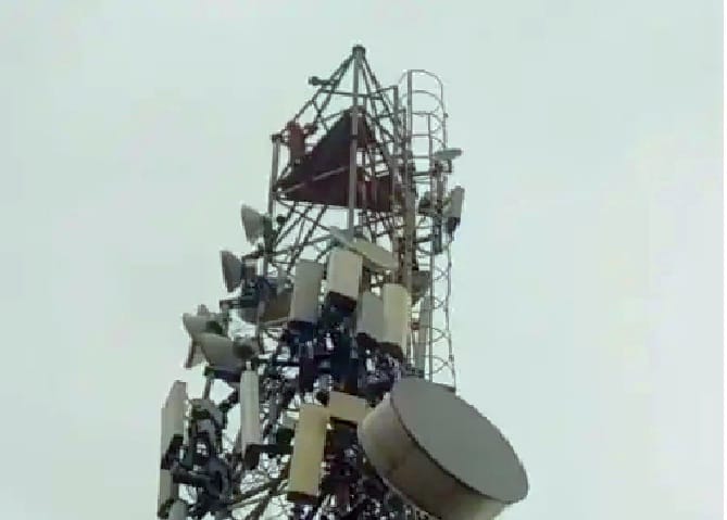 Distressed over his wife visiting her parents' home, a young man climbed a tower.