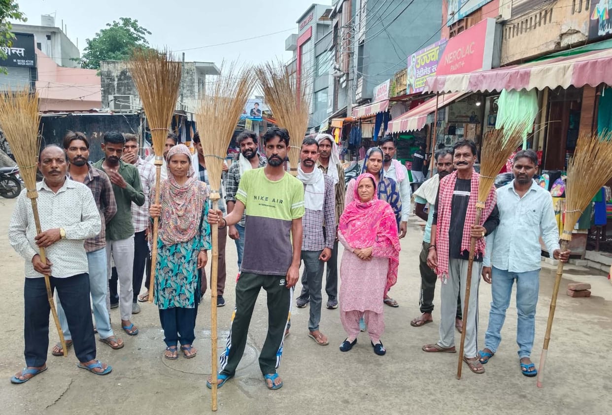 Sanitation workers halted work and staged a protest