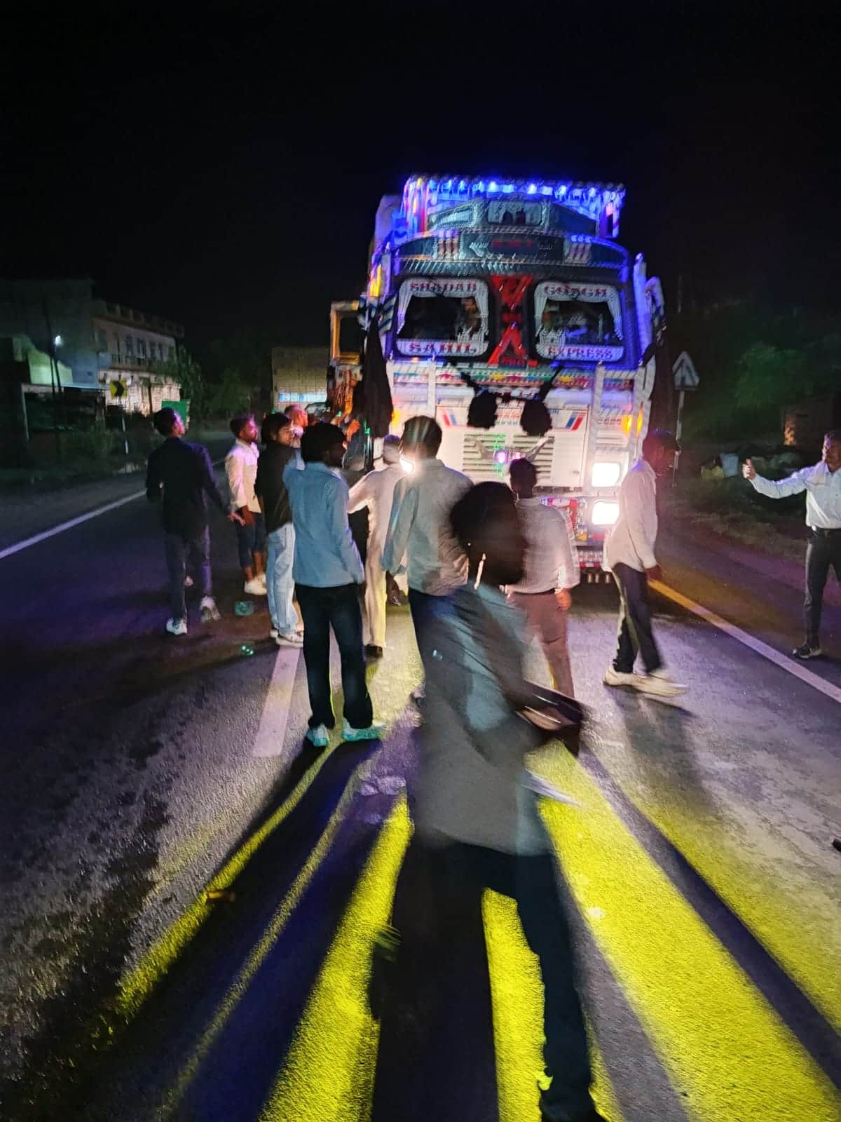 Wedding guests attacked a truck with bricks and stones and beat up the driver.