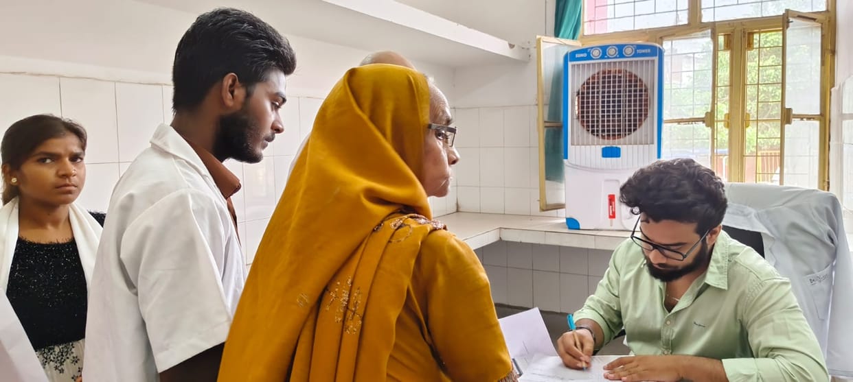 Instead of providing an X-ray film, photos of the X-ray are being taken using a mobile phone.