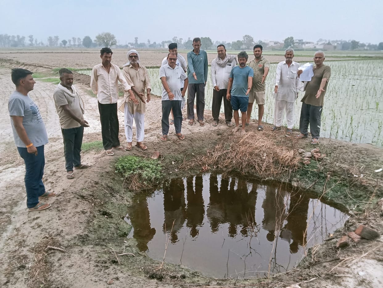 Demanding restoration of 16-kanal pond land, villagers protested against the Panchayat.