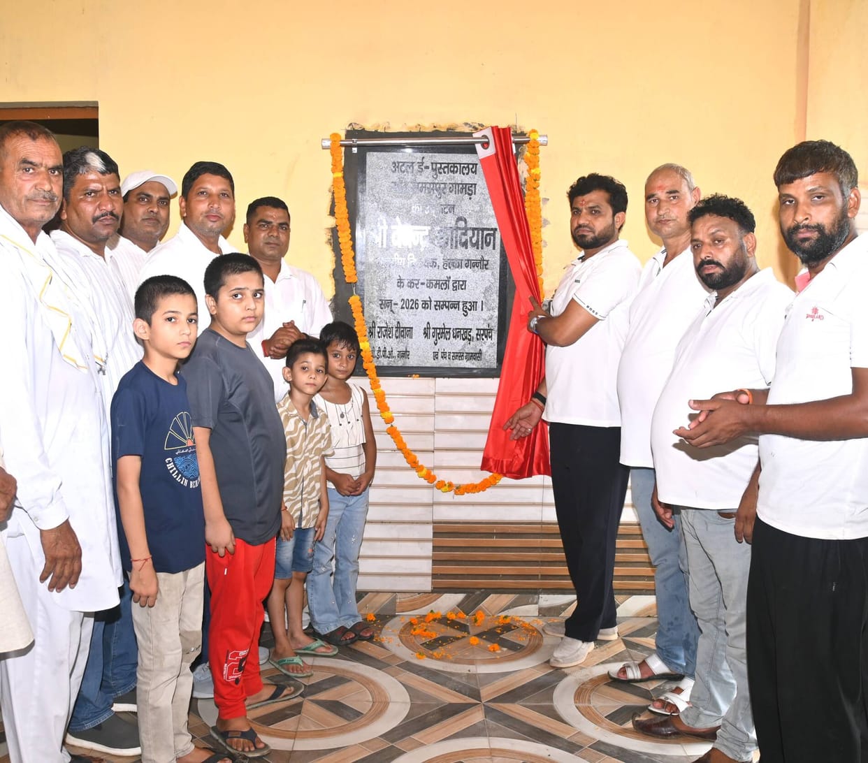 MLA inaugurates community meeting place, lays foundation stone for street.