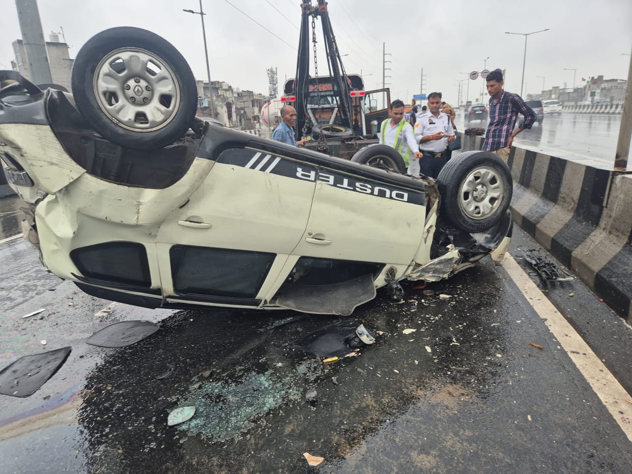 Cement mixer and car overturn on highway in the rain