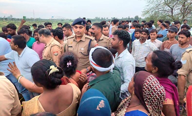 Body of young man found, associate accused of murder, protest held