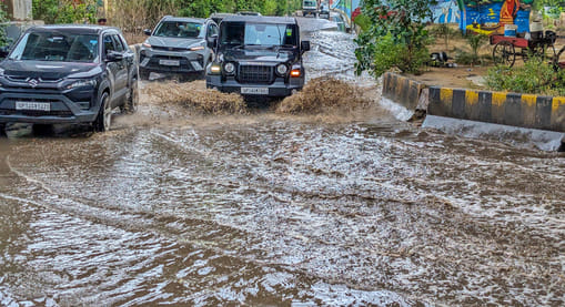 Navigating waterlogged roads became difficult; traffic crawled throughout the day.