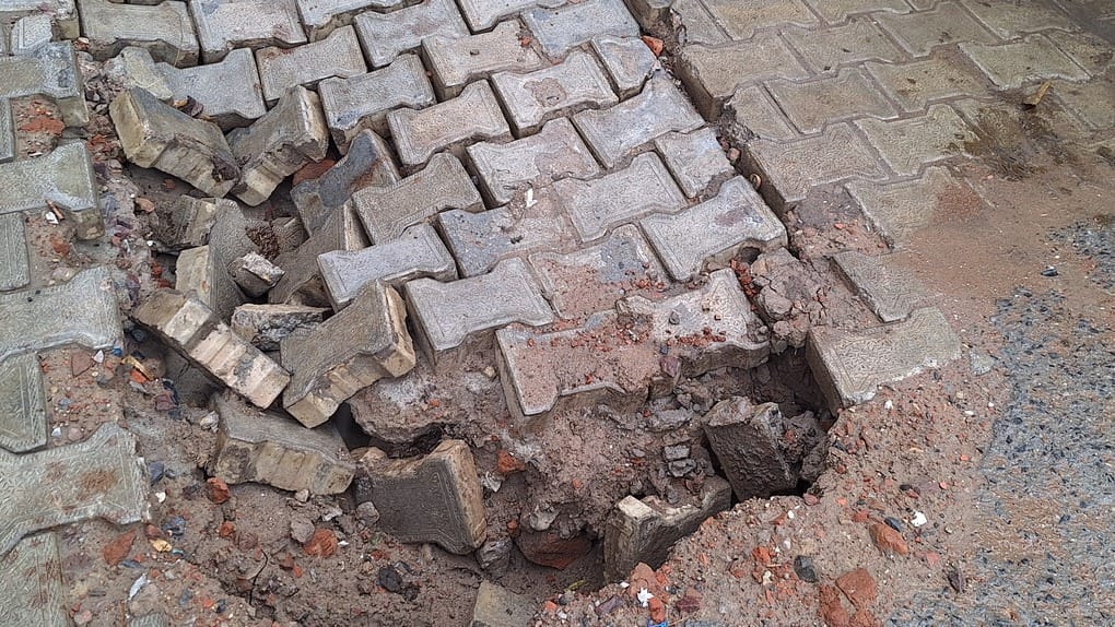 Waterlogging at a dozen locations and road cave-ins due to rain.