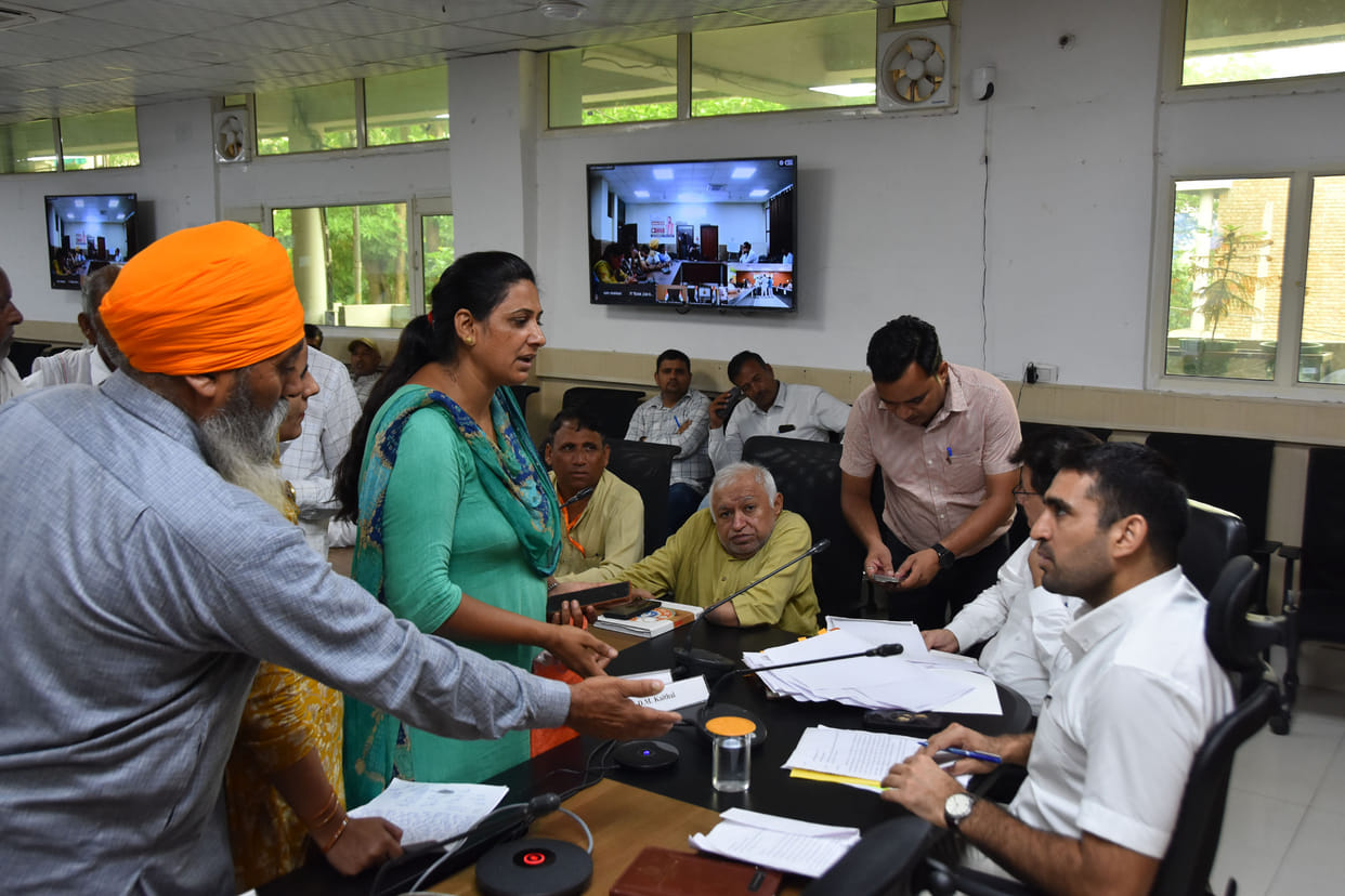 Plea for addressing incomplete shed construction in Ataila, and waterlogging and pond overflow issues in Manas.