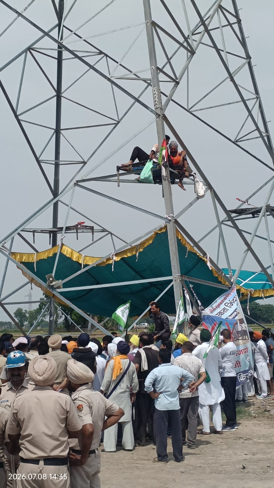 9 framers climbed on tower sit on cot
