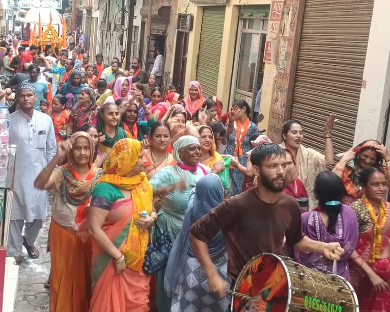 A ceremonial procession was taken out, accompanied by a musical band.