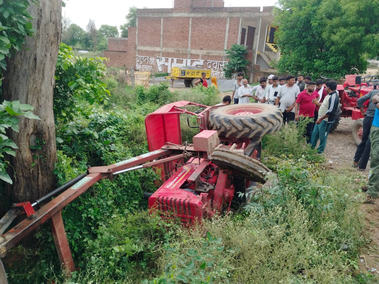 Out-of-control tractor fell into a ditch.